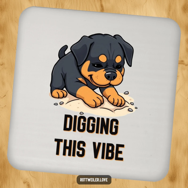 Funny Rottweiler coaster depicting a dog playfully digging in sand, adding lighthearted fun to drink protection.