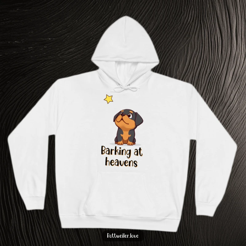 Funny Rottweiler dog with a look of pure surprise gazing up at a falling star, on a warm hoodie.