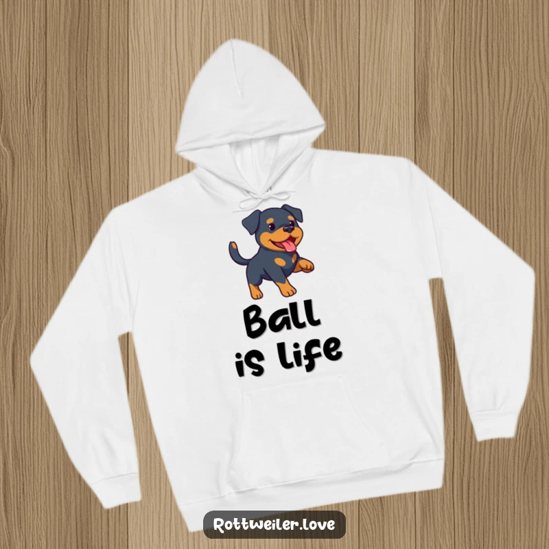 Funny Rottweiler hoodie depicting a determined Rottweiler ready to retrieve a stick during a game of fetch. Soft and warm fleece.