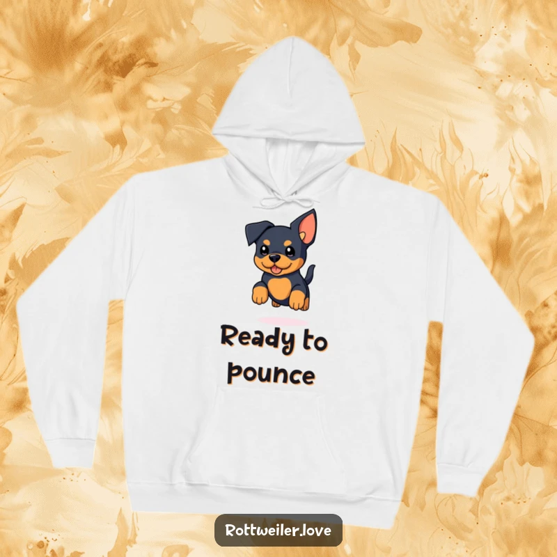 Funny Kawaii Rottweiler Hoodie depicting a cute rottweiler with enormous ears captured in a happy jump, tail wagging furiously.