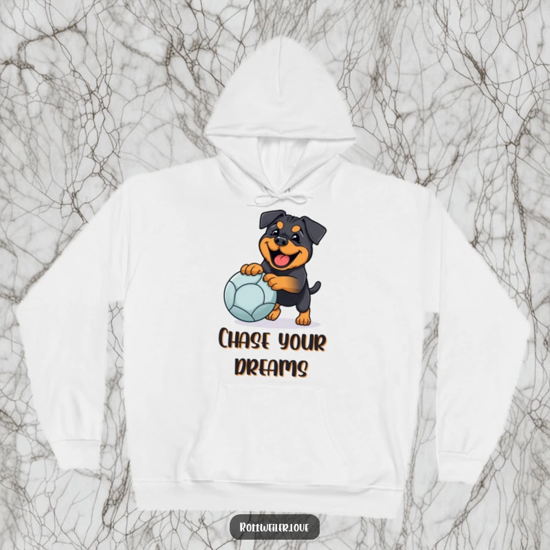 Funny rottweiler hoodie with a happy dog playing fetch with a large ball, offering cozy humor and doggy fun.