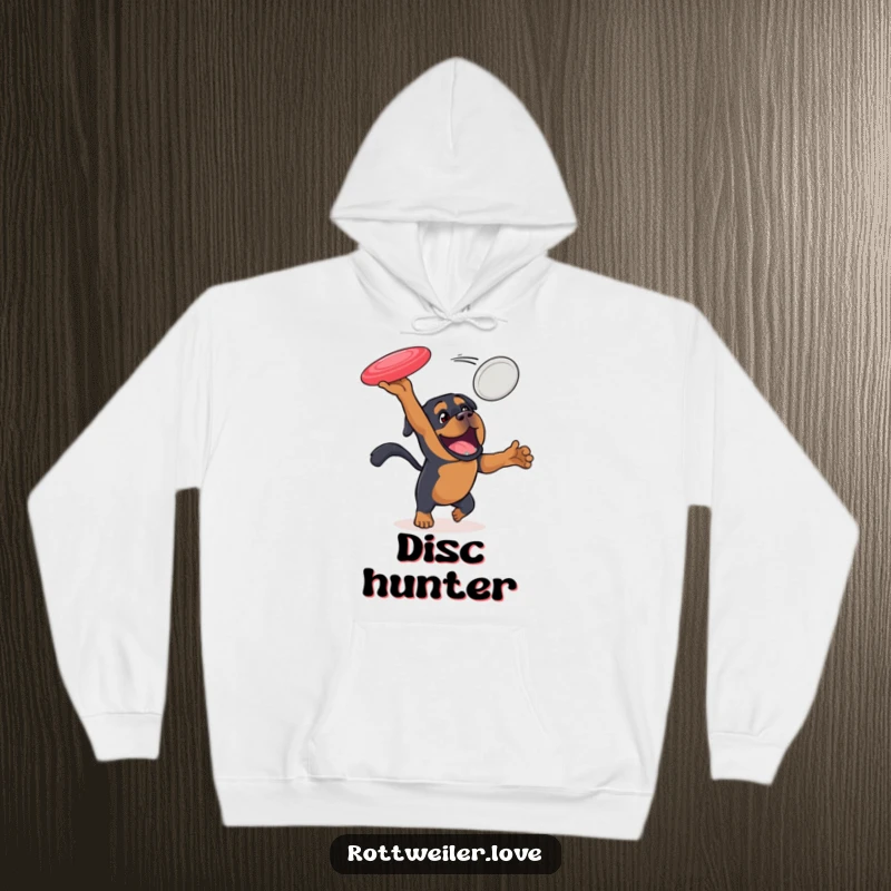 Funny Rottweiler hoodie depicting an active dog leaping high to catch a flying disc, symbolizing energy and athletic prowess.