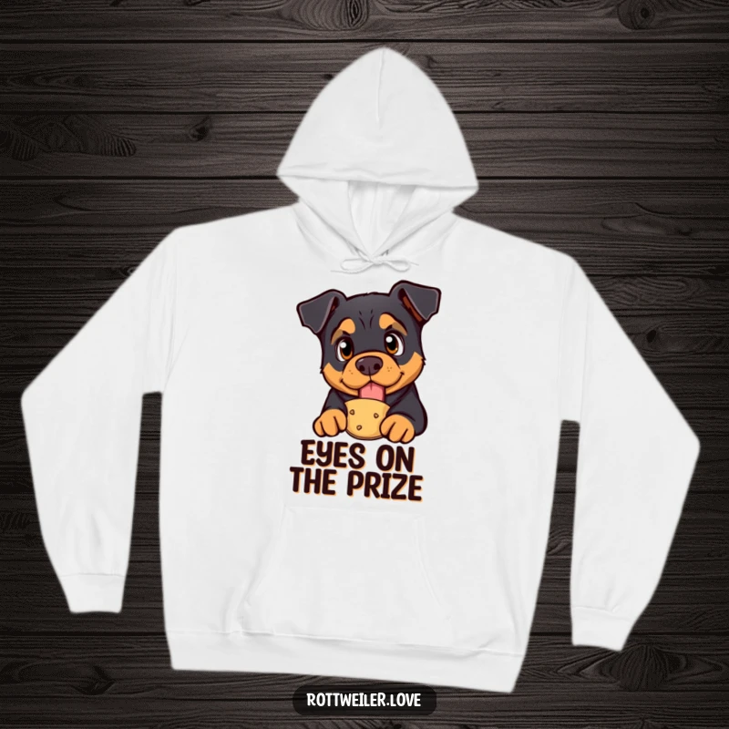 Funny rottweiler hoodie with a curious dog with bright eyes looking at a treat, offering cozy humor and eager anticipation.