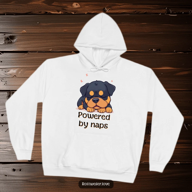 Funny sleepy Rottweiler dog dreaming, embodying peaceful slumber humor in this cozy hoodie.