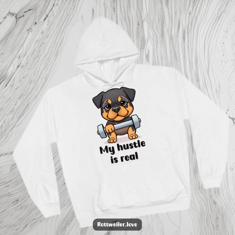 Funny hoodie featuring a Rottweiler with a determined expression lifting a dumbbell, offering warmth and humorous workout motivation.
