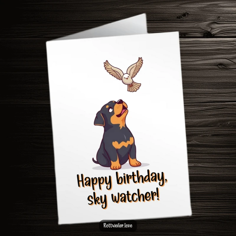 Funny Free Printable Birthday Card: A rottweiler looking up with pure enthusiasm at a soaring bird, celebrating you.