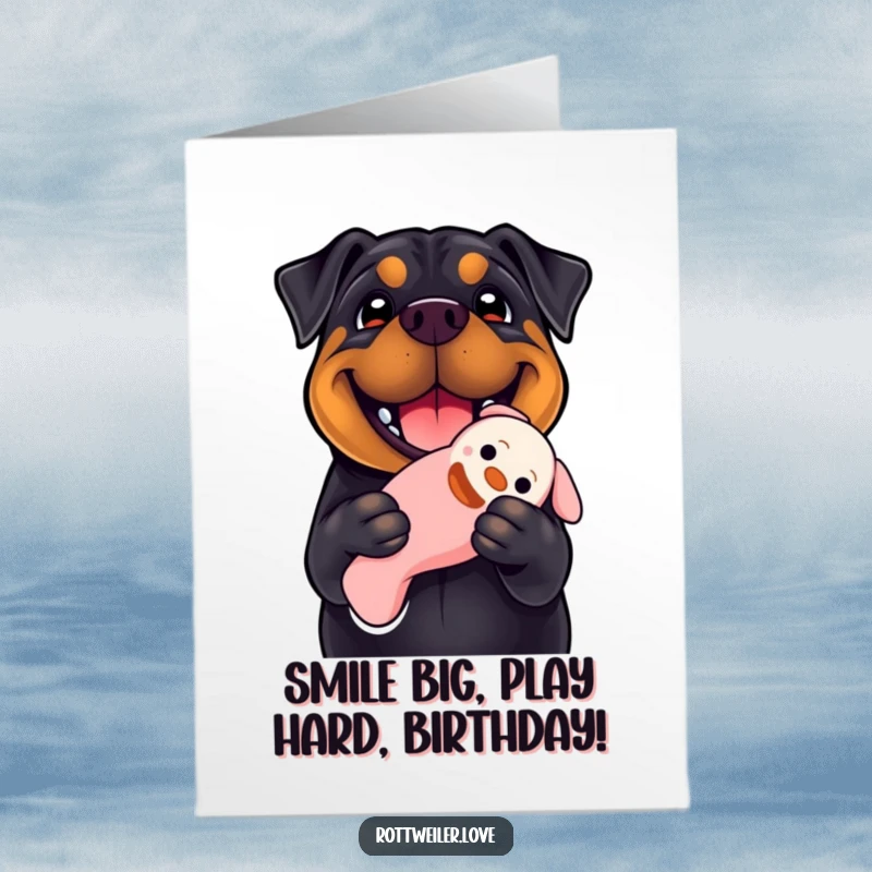 Funny free printable birthday card shows a happy Rottweiler grinning widely, clutching a floppy squeaky toy in its mouth.