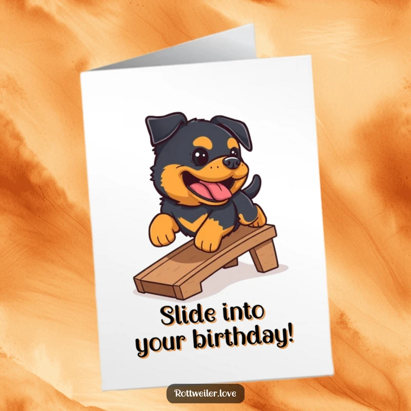 Funny Free Printable birthday card of a Rottweiler sliding down a small ramp with a gleeful bark, radiating pure birthday happiness.