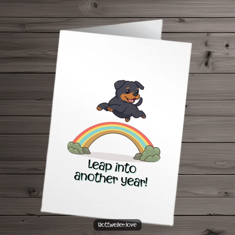 Funny Free Printable Rottweiler Birthday Card: A Rottweiler bounds joyfully over a vibrant rainbow bridge, celebrating your big day.