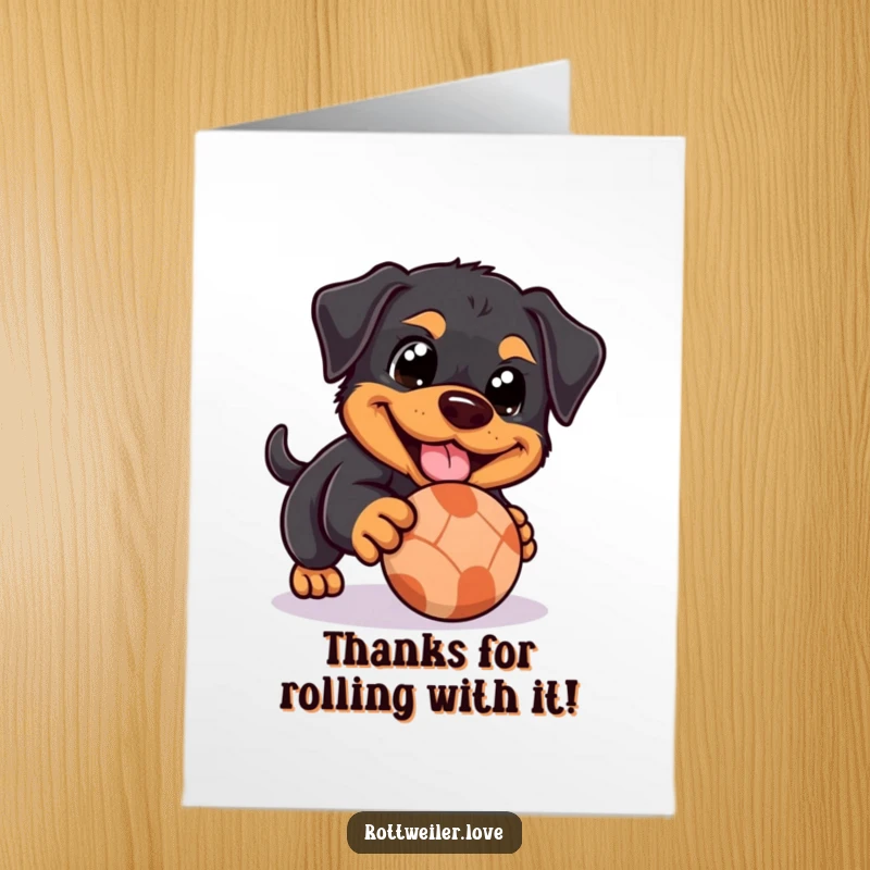 Funny free printable thank you card features a Rottweiler with joyful eyes playfully nudging a rolling ball.