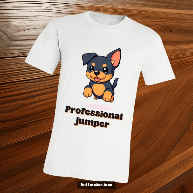 Funny Rottweiler T-Shirt showcasing a kawaii rottweiler with overly large ears leaping with excitement and a happy, wagging tail.