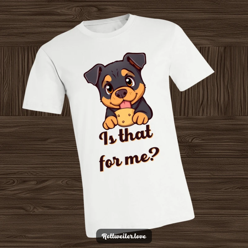 Funny rottweiler t-shirt showing a curious dog with bright eyes looking at a presented treat, a humorous and eager graphic.