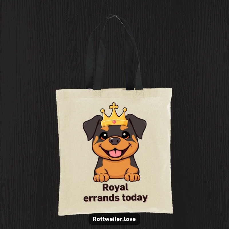 Funny tote bag featuring a smiling Rottweiler wearing a tiny crown, exuding royal charm and humorous practicality.