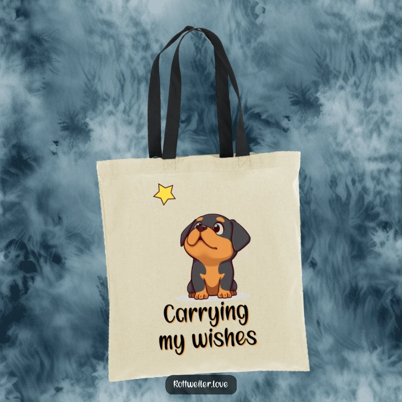 Funny Rottweiler dog with astonished expression looking up at a falling star, on a practical tote bag.